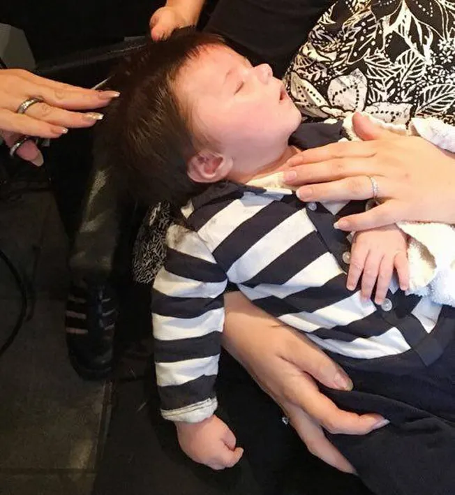 Jesse's first hair-cut at seven weeks.