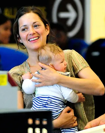 1315357391_marion cotillard vetical thumb