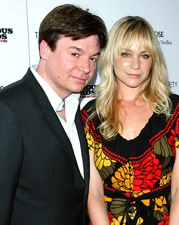 1317320696_mike myers kelly tisdale 441