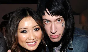 1318627130_brenda song trace cyrus engaged 178