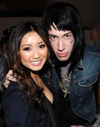 1318627130_brenda song trace cyrus engaged 350