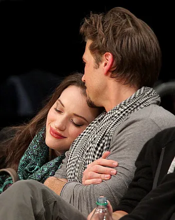 1325795476_kat dennings nick zano 350