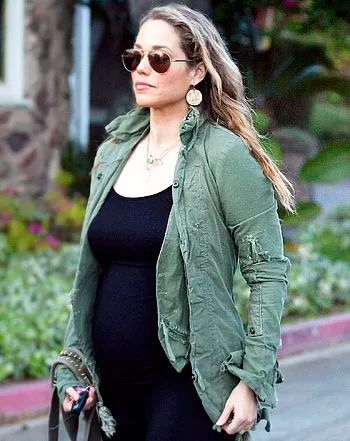 1331040062_elizabeth berkley 4441