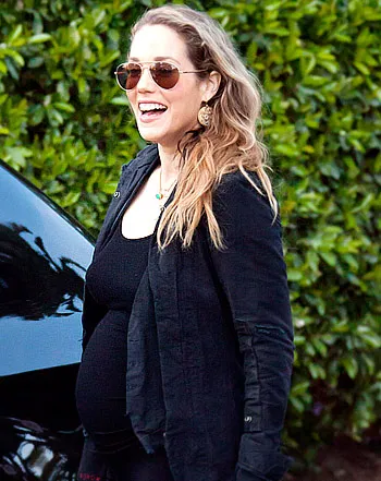 1343671829_elizabeth berkley 350