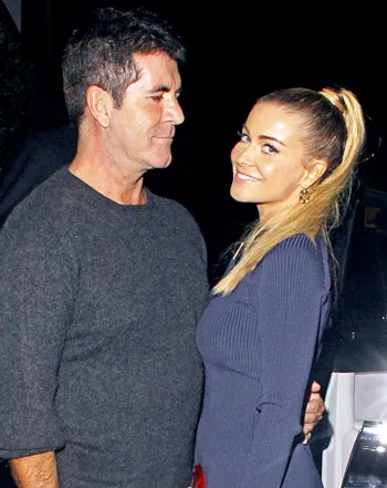 1352150694_simon cowell carmen electra 350