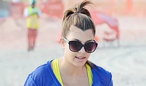 1359060847_kourtney kardashian 1 300