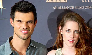 1360681008_kristen stewart taylor lautner 178