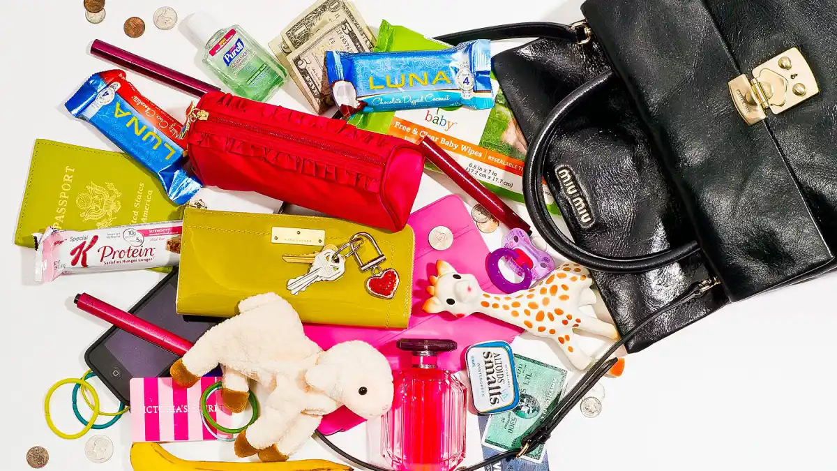 Adriana Lima empties out her purse for Us