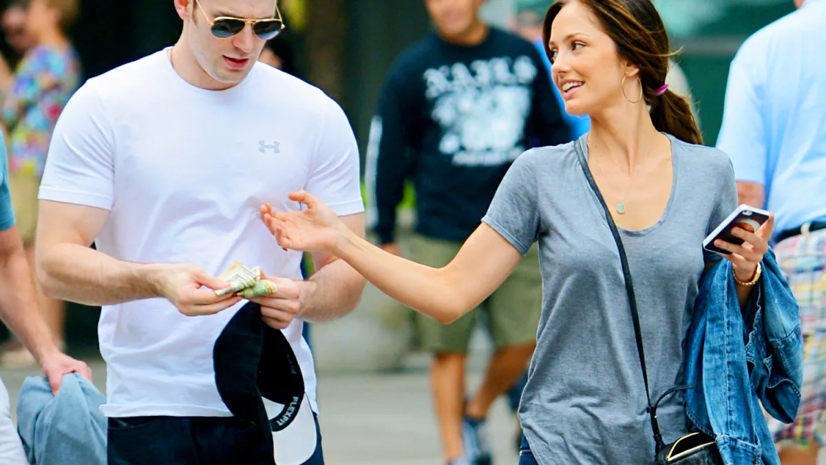 Minka Kelly affectionately grabbed Chris Evans' chest -- and held her
