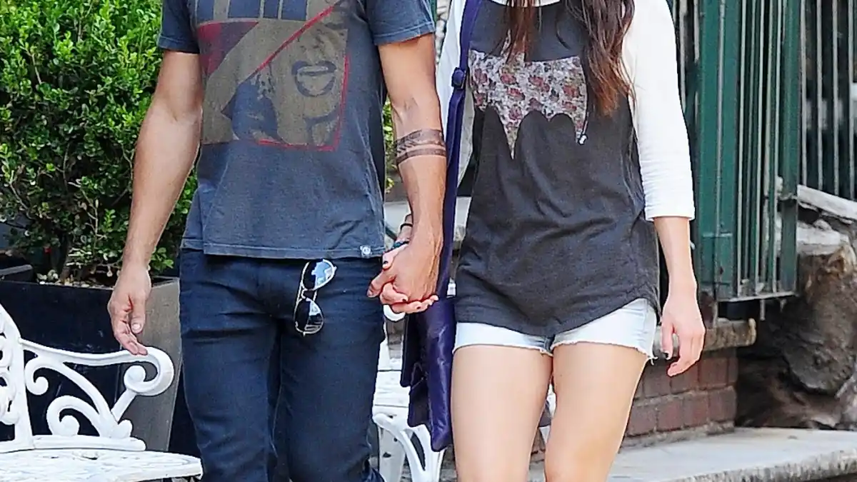 Taylor Lautner and Marie Avgeropoulos in New York on July 29, 2013