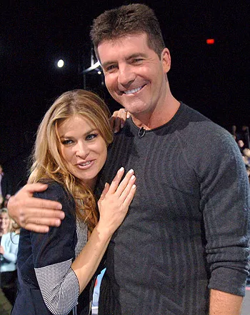 1375370679_carmen electra simon cowell 441