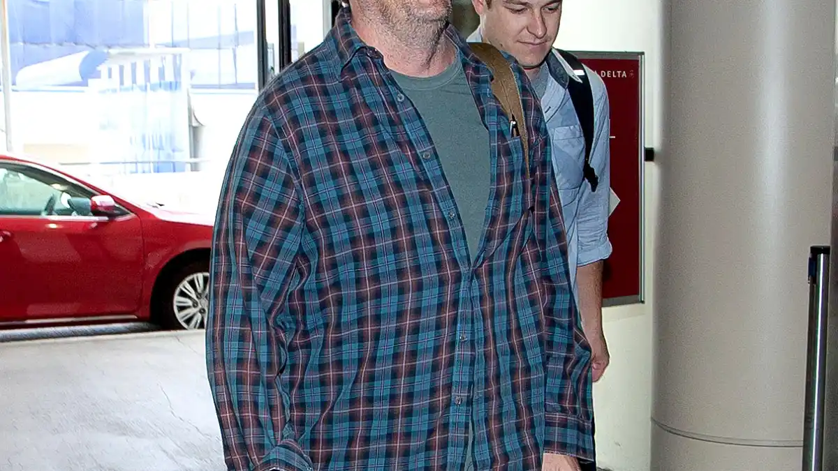 Matthew Perry as he prepares to depart at LAX on August 18, 2013.