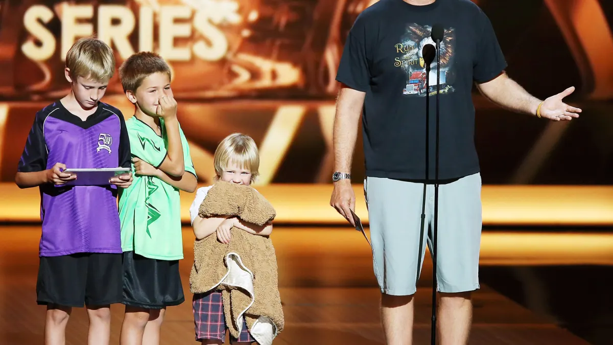 Will Ferrell and his children on stage at the 2013 Emmy Awards