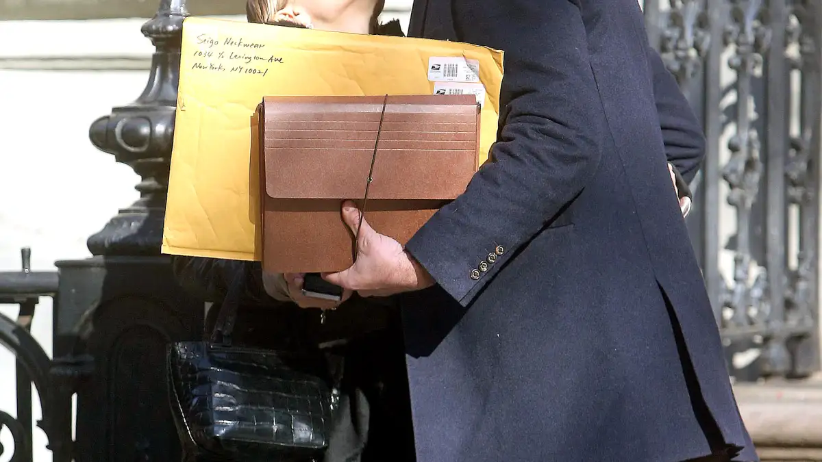 Mary-Kate Olsen and Olivier Sarkozy share a kiss in NYC on Dec. 12