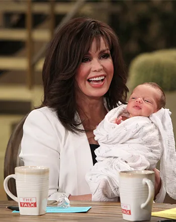 1390060229_marie osmond v