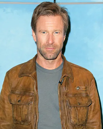 1390426794_463239337_aaron eckhart 350