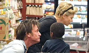1390487501_sean penn jackson charlize theron 300