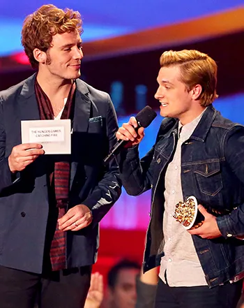 1397447388_484688735_sam claflin josh hutcherson 350