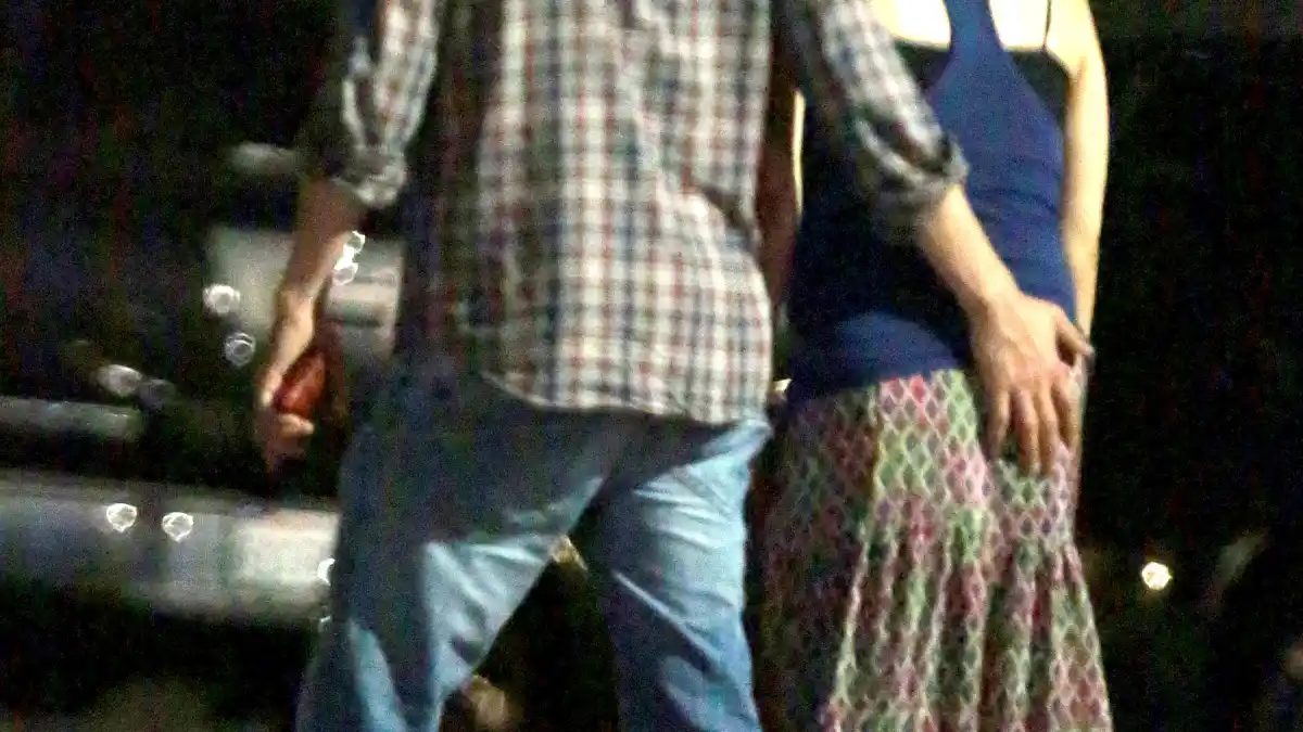 Ashton Kutcher puts hand on Mila Kunis' butt on May 18, 2014
