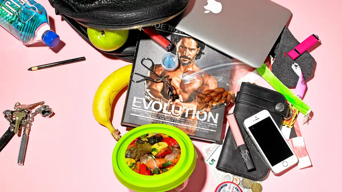 Laura Prepon spills her knapsack for Luxury Handbag Shopping.