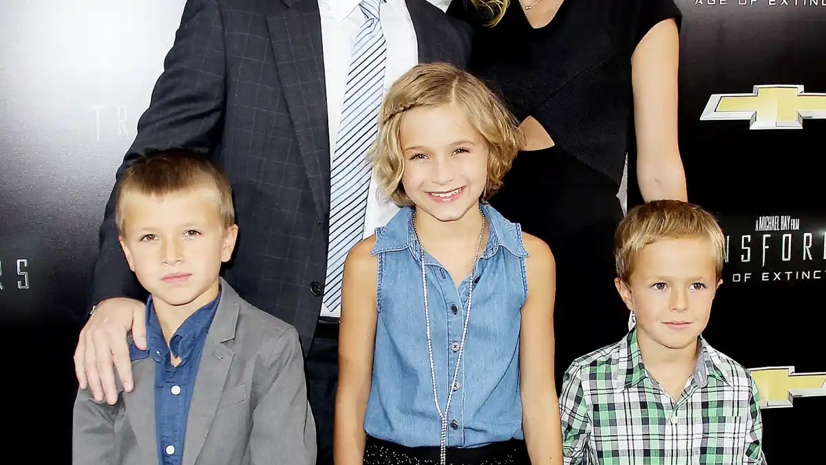 Mark Wahlberg and Rhea Durham pose on the red carpet with their kids