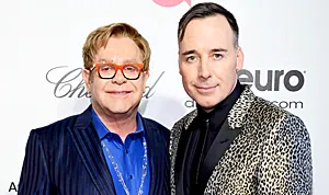 1404148919_476508613_elton john david furnish 300