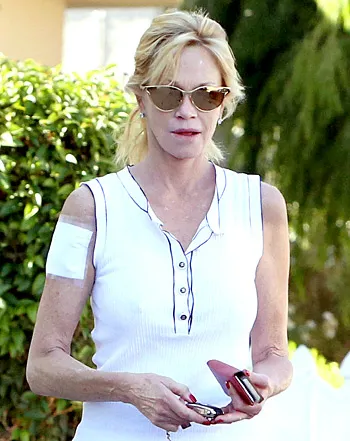 1404829230_melanie griffith 350