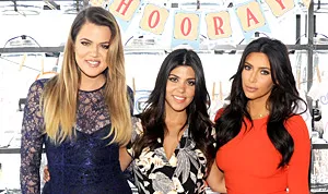 1405090991_khloe kourtney kim kardashian 300