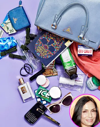 1406850790_famke janssen blue bag 350