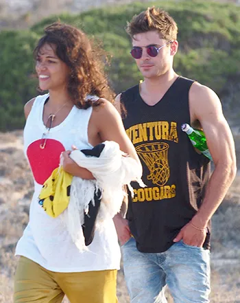1407081766_michelle rodriguez zac efron_3