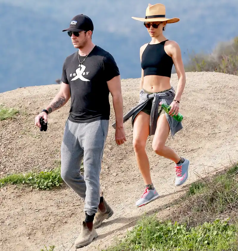 Maggie Q and Dylan McDermott hiking