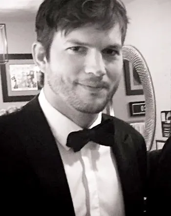 1424381286_ashton kutcher jon cryer 350