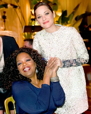 1424899364_464134452_marion cotillard oprah winfrey 350