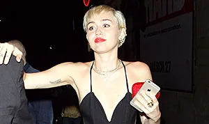 1426616044_miley cyrus jumpsuit 300