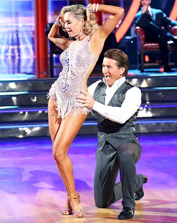 1427203604_466553426_kym johnson robert herjavec 350