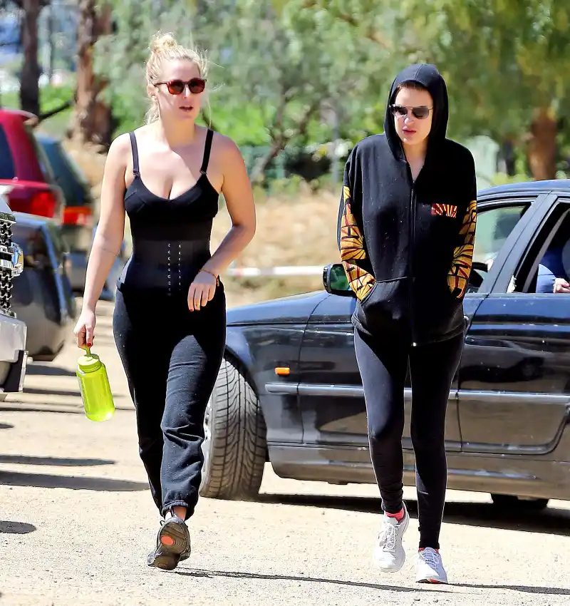 Scout Willis wears a waist trainer while hiking with Tallulah.