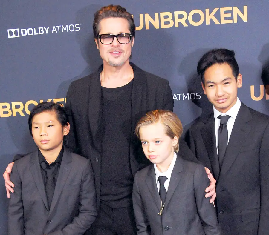 1434129135_460891584_brad pitt pax shiloh maddox zoom