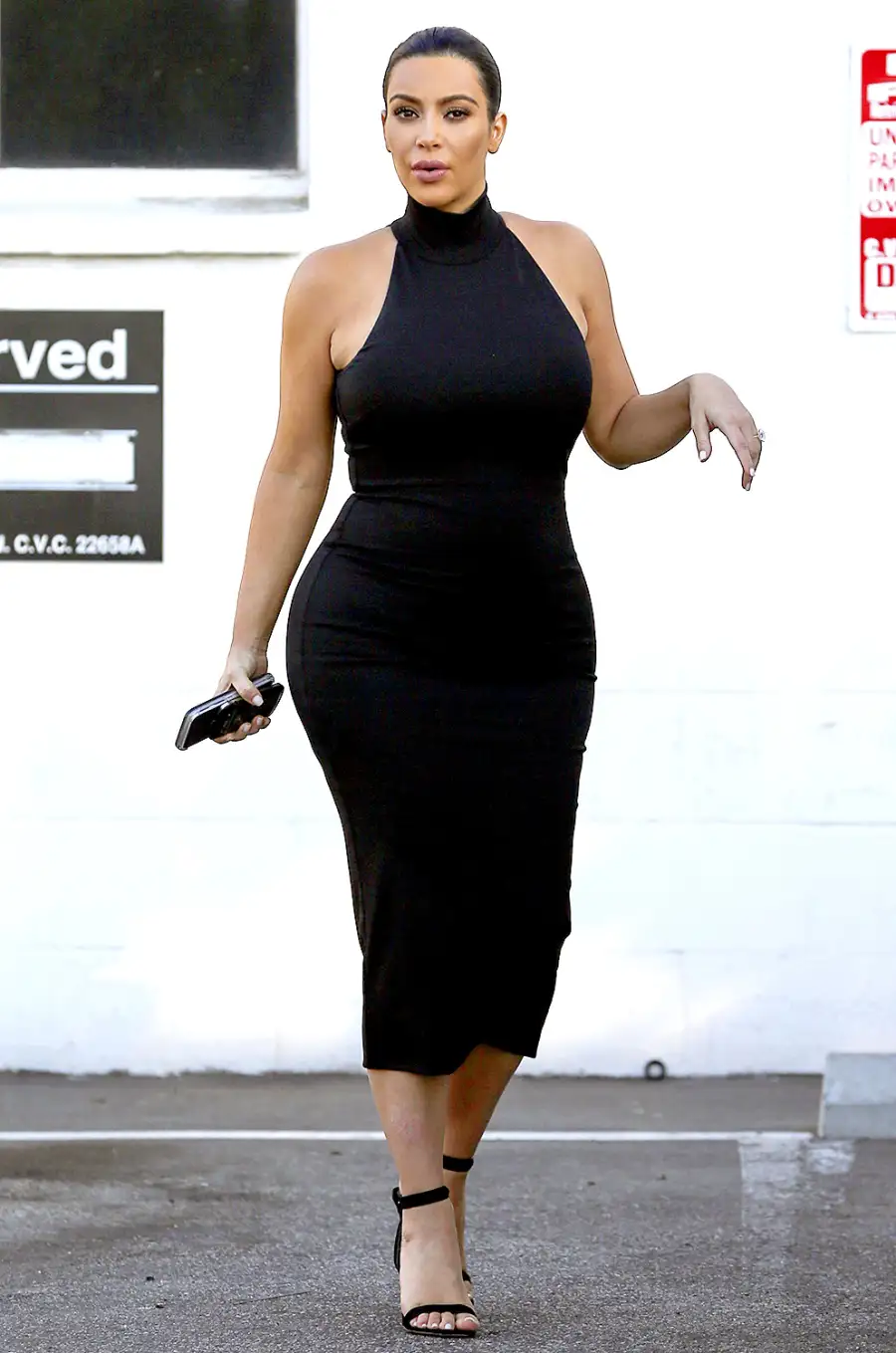1436450787_kim kardashian black turtleneck dress zoom