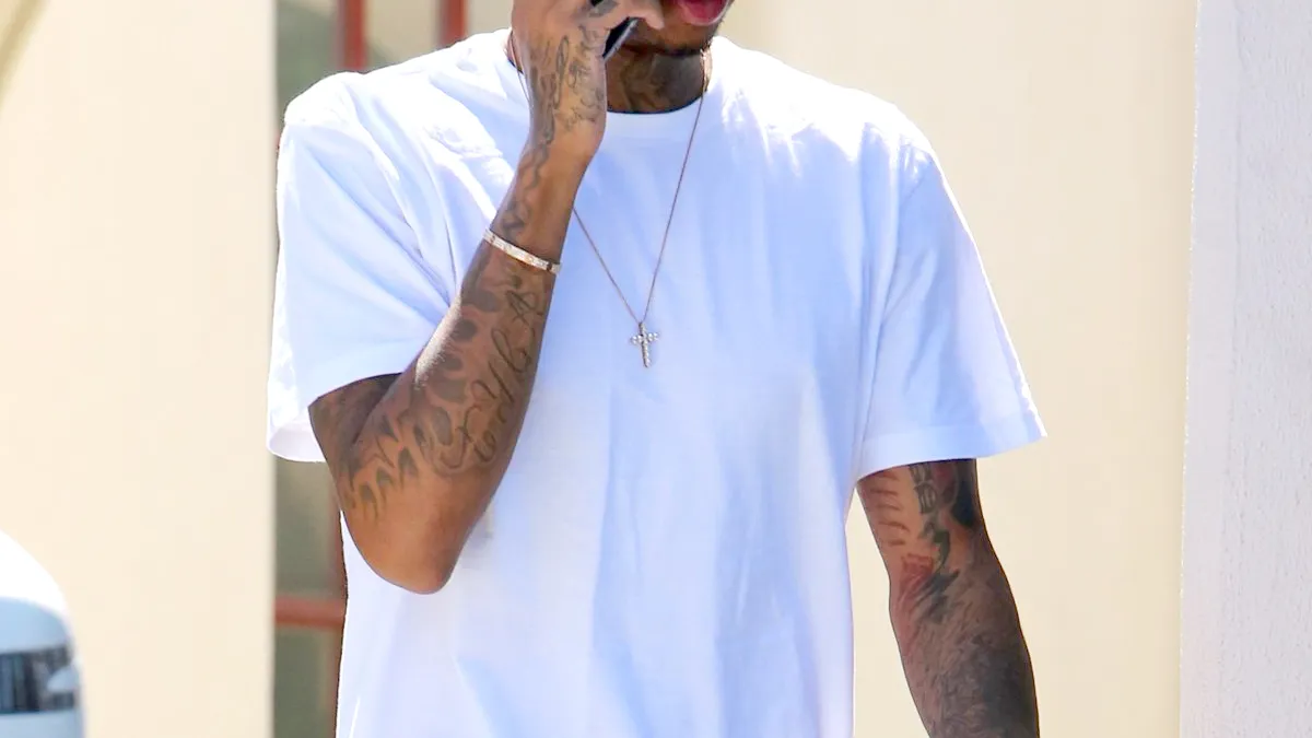 Tyga Walks Around With Giant Wads of Cash