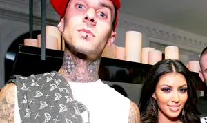 1445362502_75961015_travis barker kim kardashian 300
