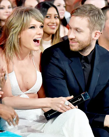 1446040641_473847606_taylor swift calvin harris 350