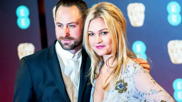 Julia Stiles and Preston J. Cook attend the 70th British Academy Film Awards at the Royal Albert Hall on February 12, 2017 in London, England.