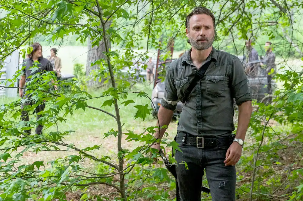 Andrew Lincoln as Rick Grimes and Norman Reedus as Daryl Dixon on The Walking Dead.