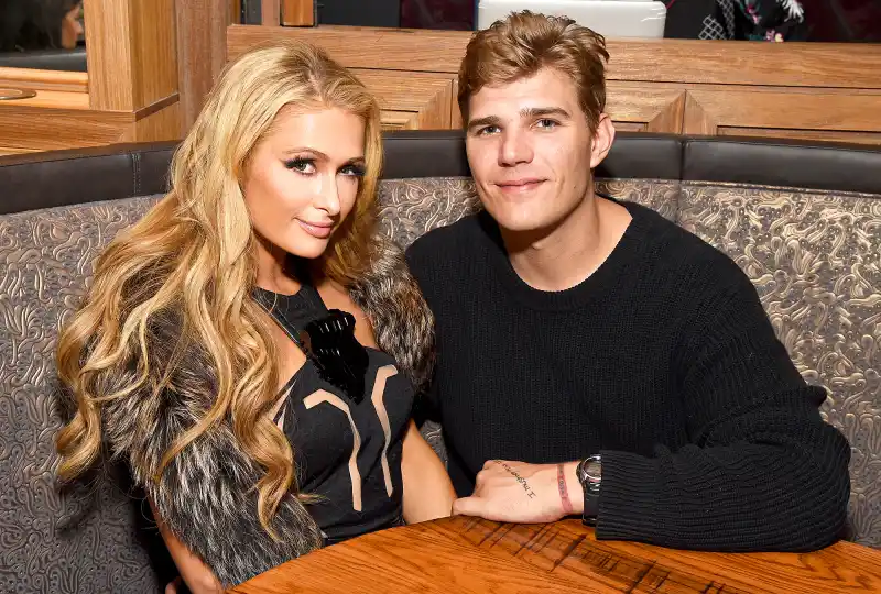 Paris Hilton and Chris Zylka attends day three of TAO, Beauty & Essex, Avenue and Luchini LA Grand Opening on March 18, 2017 in Los Angeles, California.
