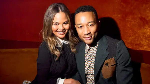 Chrissy Teigen and John Legend attends the Miu Miu aftershow during the Paris Fashion Week at Boum Boum in Paris, France.
