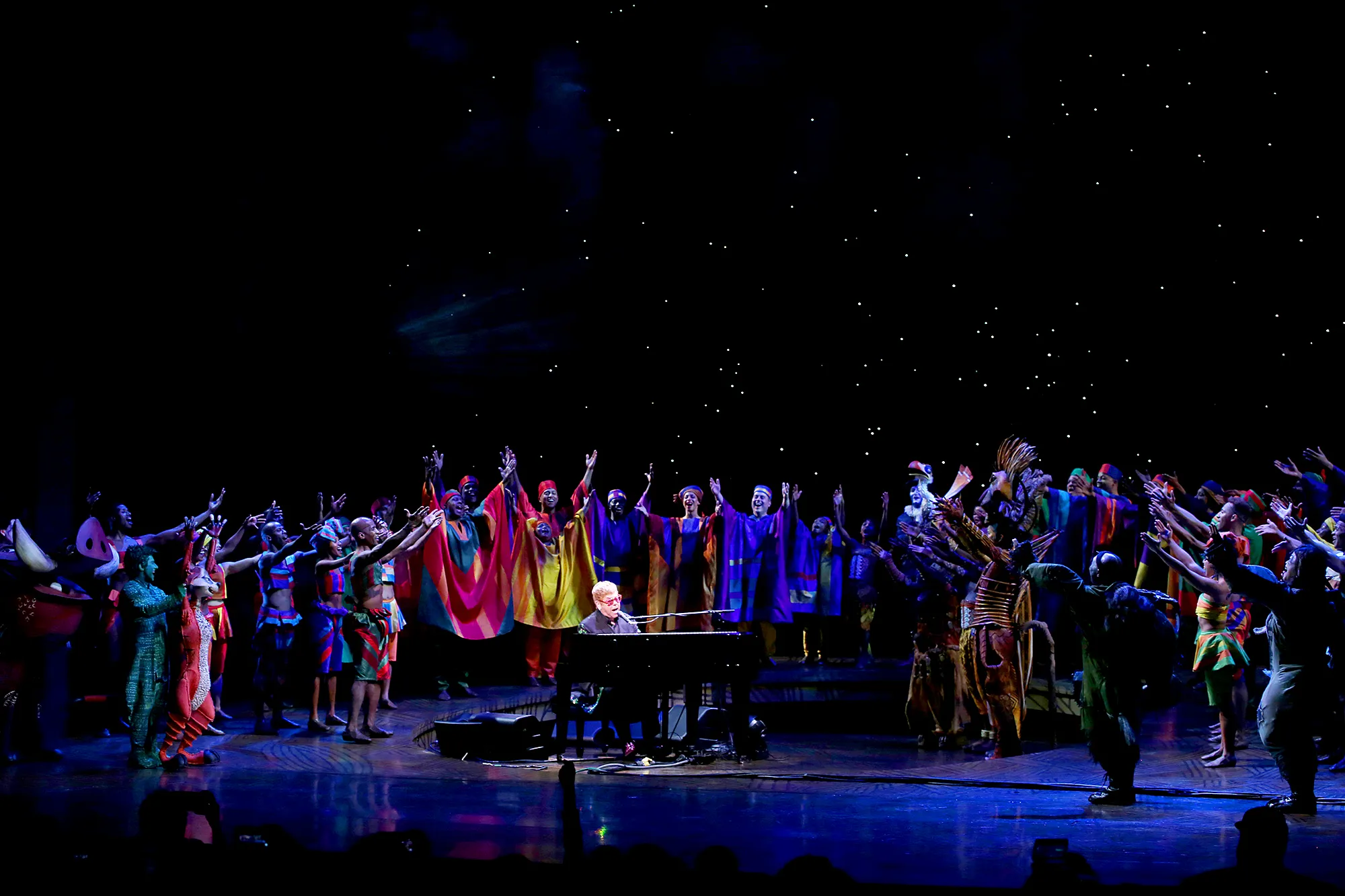Elton John with the cast performing during the Curtain Call for 20th Anniversary Performance of 'The Lion King' on Broadway at The Minskoff Theatre on November 5, 2017 in New York City.
