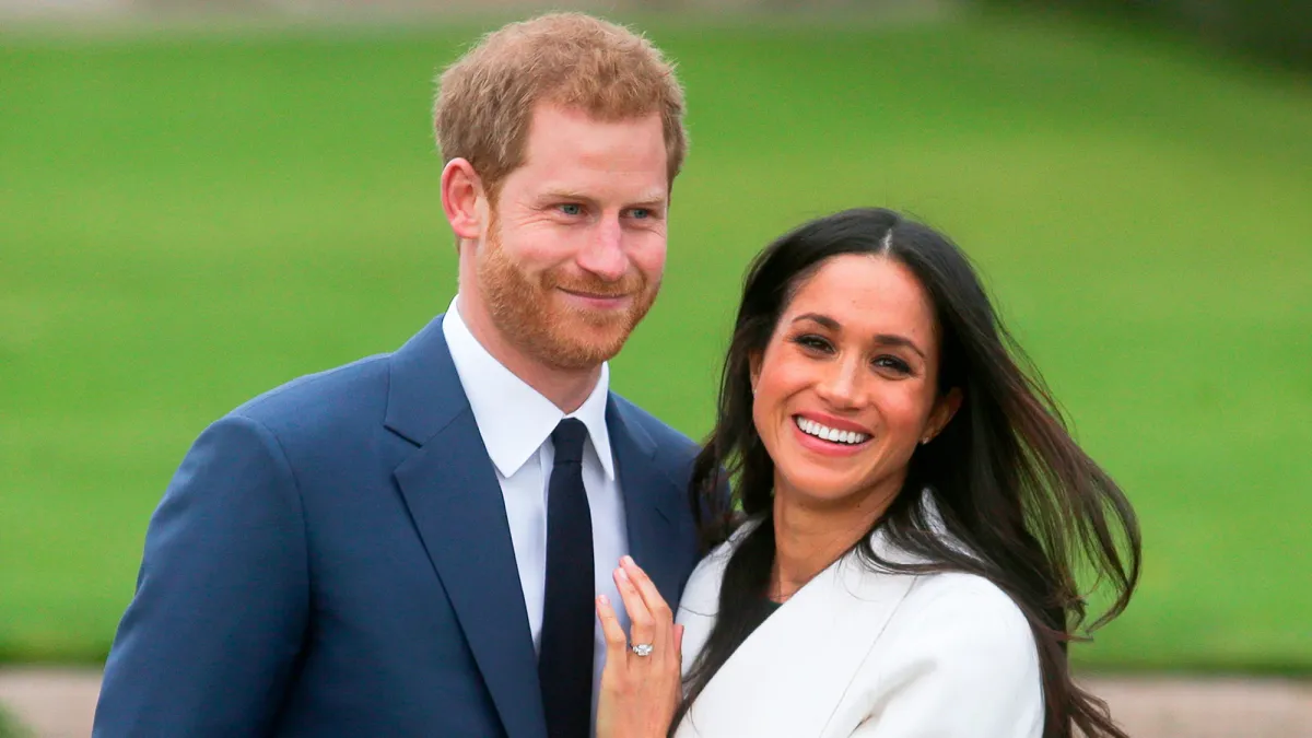 Prince Harry and Meghan Markle attend an official photocall to announce their engagement at The Sunken Gardens at Kensington Palace on November 27, 2017 in London, England.