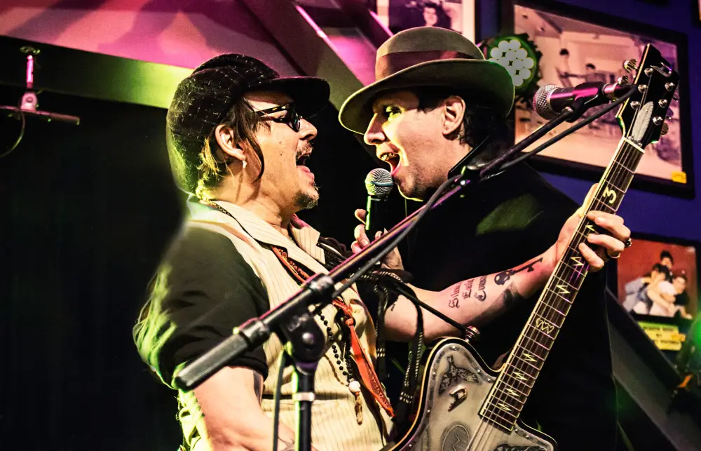 Johnny Depp (L) and Marilyn Manson