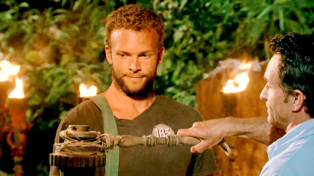 Jeff Probst extinguishes John "JP" Hilsabeck's torch at Tribal Council on &lsquo;Heroes vs. Healers vs. Hustlers&lsquo;