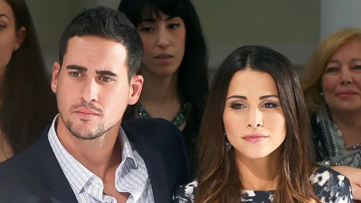 Josh Murray and Andi Dorfman attend front row at The Mark Zunino For Kleinfeld 2015 Runway Show at Kleinfeld in New York City.